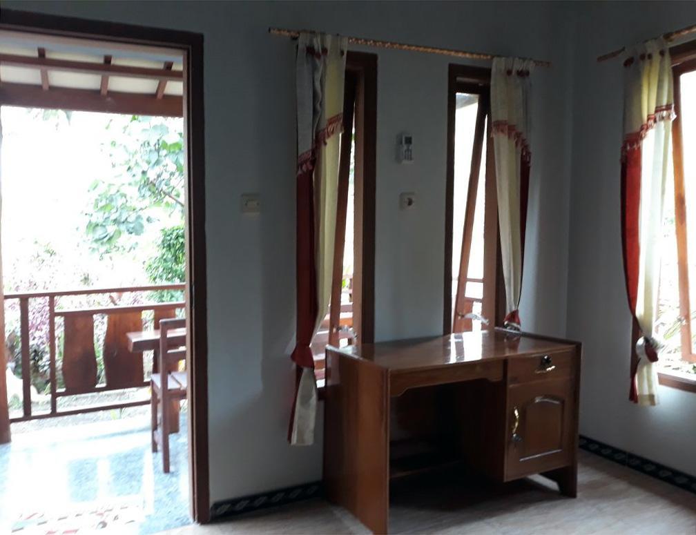 Red Island Bungalows Pasanggaran Rum bild